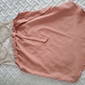 Pink and cream sleeveless blouse